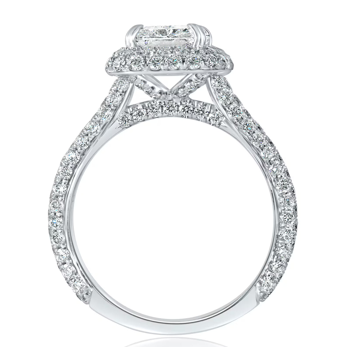 Side profile view of a 4 CT radiant lab grown diamond engagement ring with double halo and pave bridge in white gold.