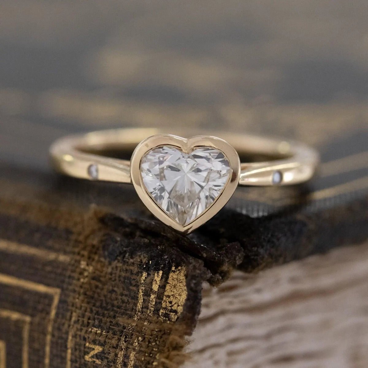 2-carat-heart-cut-lab-grown-diamond-bezel-set-engagement-ring-front-view