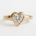 front-macro-view-of-heart-cut-lab-diamond-bezel-engagement-ring