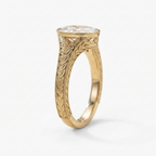 Side profile view of a 2 CT oval lab-grown diamond engagement ring with leaf engraving in yellow gold.