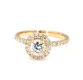 Direct top view of an IGI certified 2 carat round cut lab-grown diamond ring encircled by a diamond halo and a gold rope accent border.