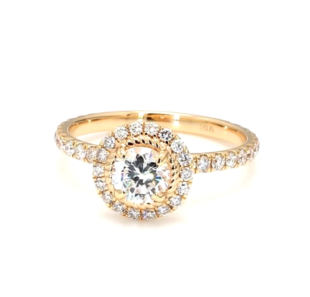 Direct top view of an IGI certified 2 carat round cut lab-grown diamond ring encircled by a diamond halo and a gold rope accent border.