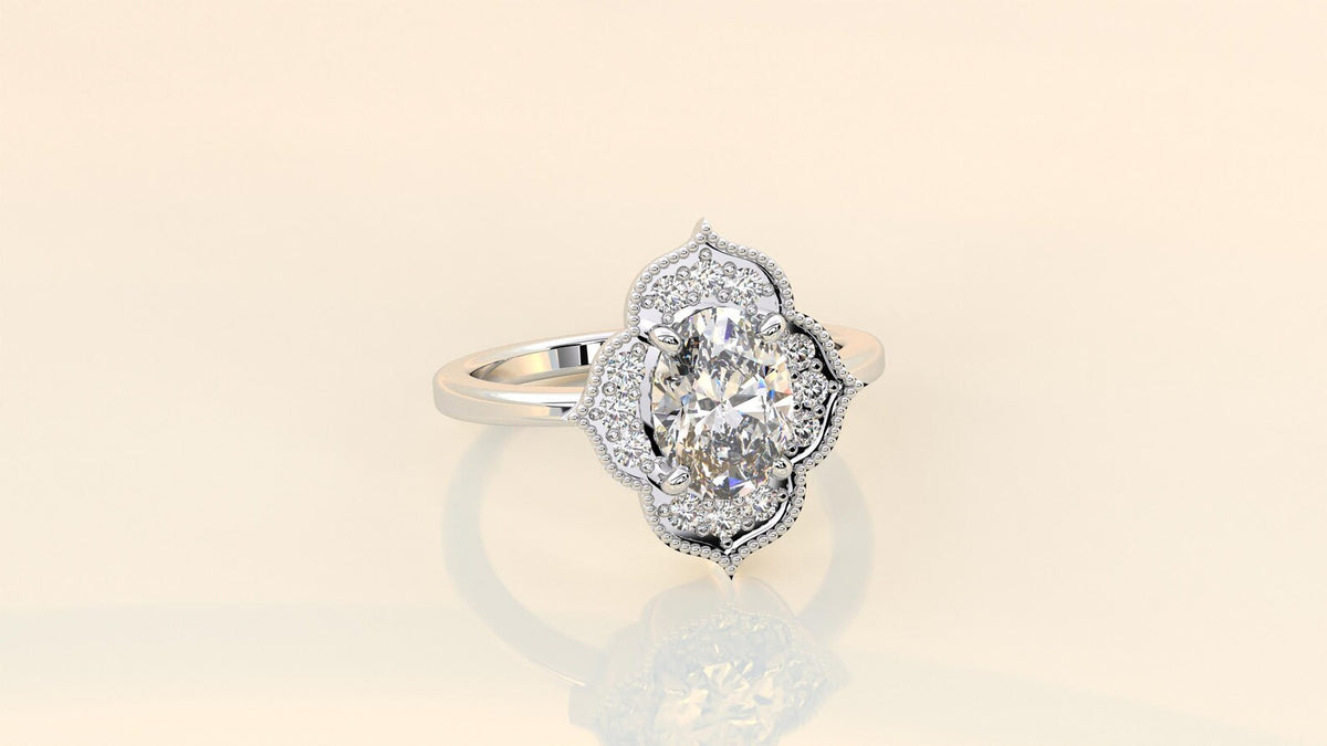 Studio presentation shot of a luxury 3 CT oval lab-grown diamond vintage halo ring on a neutral background.
