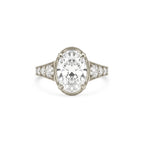 Direct overhead perspective of a 4 CT oval cut lab-grown diamond vintage ring styled in white gold.