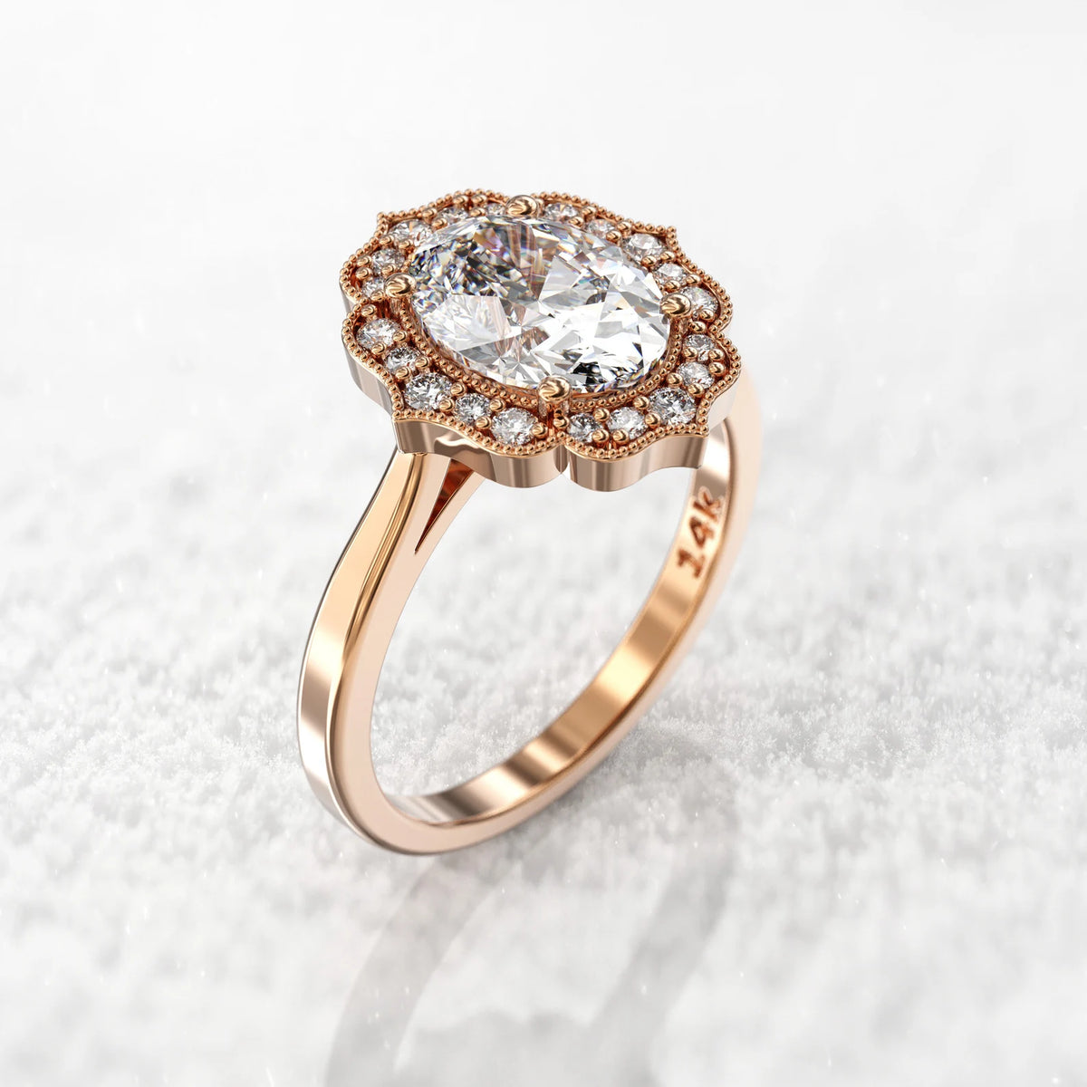 Angled side profile view of a 3 CT oval lab-grown diamond ring featuring a scalloped halo in rose gold.