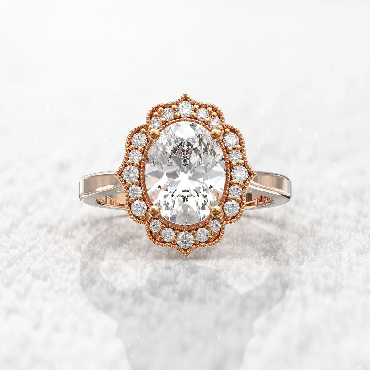 Direct top-down view of a 3 CT oval cut lab-grown diamond with an antique scalloped halo in rose gold.