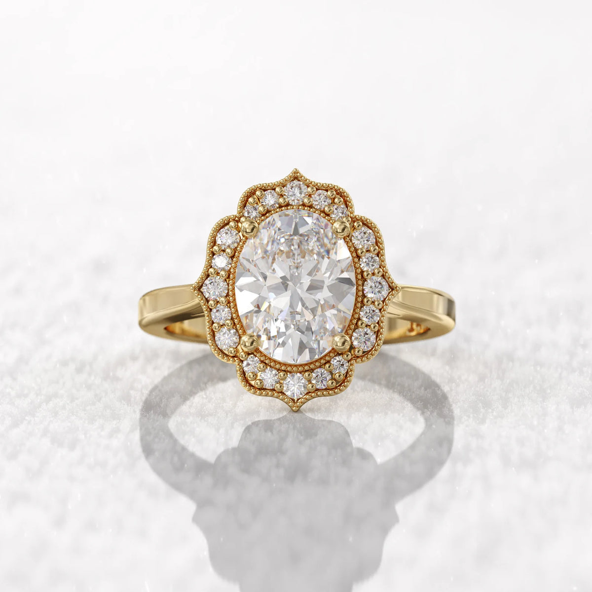 Overhead display of an antique-inspired 3 CT oval cut lab-grown diamond ring styled in yellow gold.
