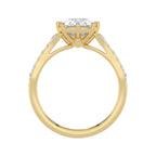 Side profile view of a 3 CT cushion cut lab-grown diamond engagement ring with side accents in yellow gold.