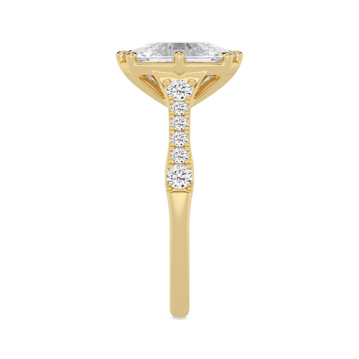Close-up side view of the pave accent stones along the band of a yellow gold cushion diamond ring.