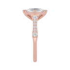 Close-up profile showing the pave-set diamonds on the shank of a rose gold ring.