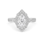 Direct overhead display of a 2 CT oval cut lab-grown diamond ring with halo and milgrain in white gold.
