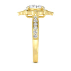 Close-up side profile displaying the accented shank and basket of a yellow gold oval diamond ring.