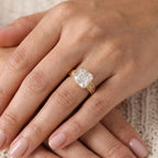 Model wearing a 3 CT Asscher-cut lab-grown diamond engagement ring with a milgrain bezel setting and vintage geometric gold band.
