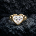 Direct overhead shot highlighting the symmetry and brilliance of a 3 CT heart lab-grown diamond in a solid gold bezel.