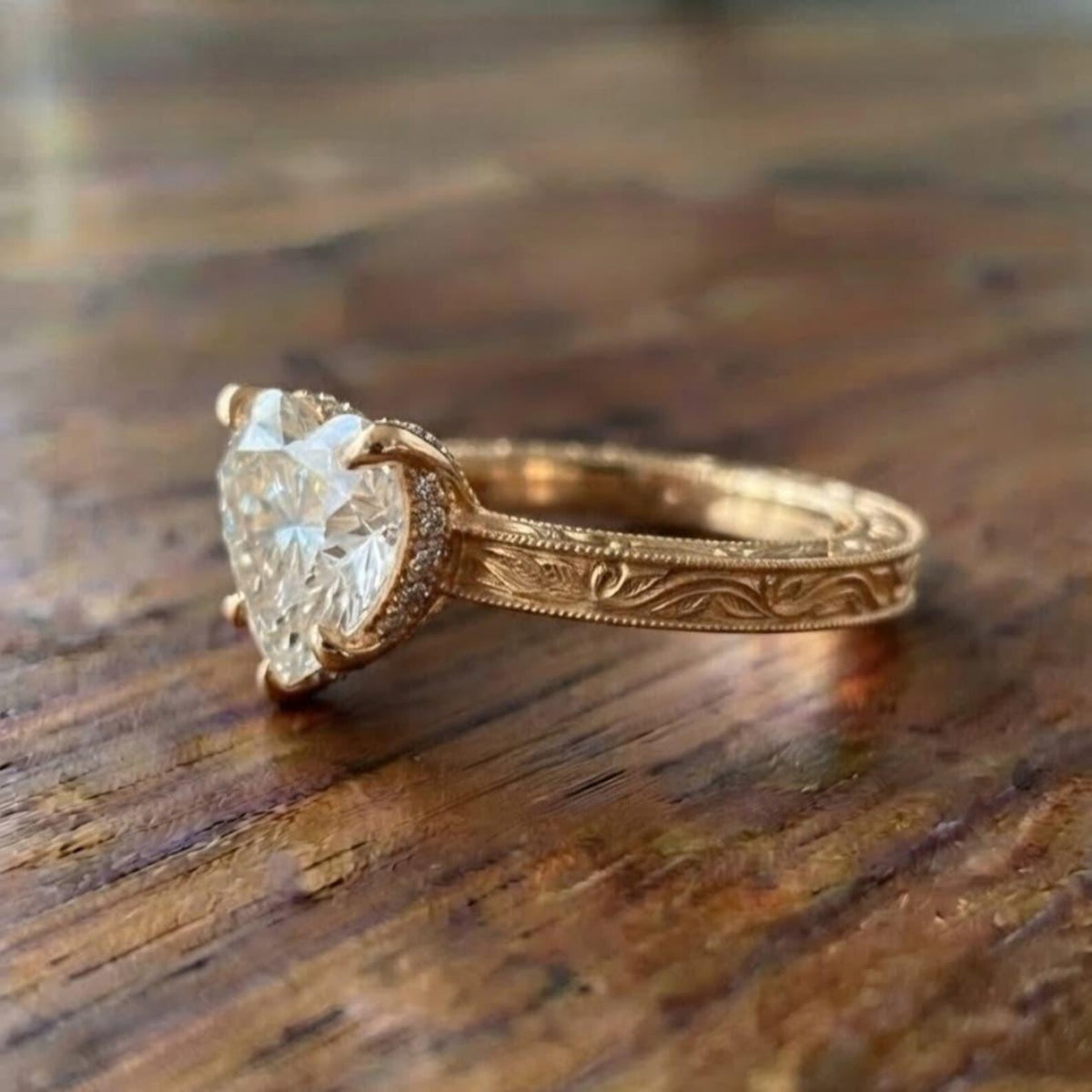 Side profile of 2 CT heart lab diamond ring highlighting micro-pavé hidden collar and milgrain engraved scrollwork.