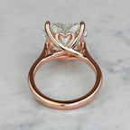 Under-gallery detail shot showing the sculpted heart motif basket in a 3 CT rose gold heart diamond ring.