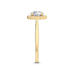 Side profile view of a 3 CT round lab-grown diamond engagement ring in 14K yellow gold with a scalloped milgrain halo setting.