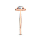 Side view profile of a 3 CT round lab-grown diamond engagement ring in 14K rose gold with milgrain scalloped border.