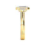 Side profile of yellow gold 4 CT emerald cut lab diamond ring showing bezel thickness and polished shank.