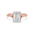 Top front view of a 4 CT emerald cut lab-grown diamond solitaire ring in 14K rose gold.