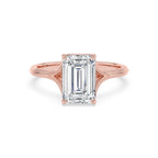 Top front view of a 4 CT emerald cut lab-grown diamond solitaire ring in 14K rose gold.