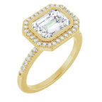 Three-quarter perspective of a 3 carat East-West emerald cut lab diamond bezel halo engagement ring in yellow gold.