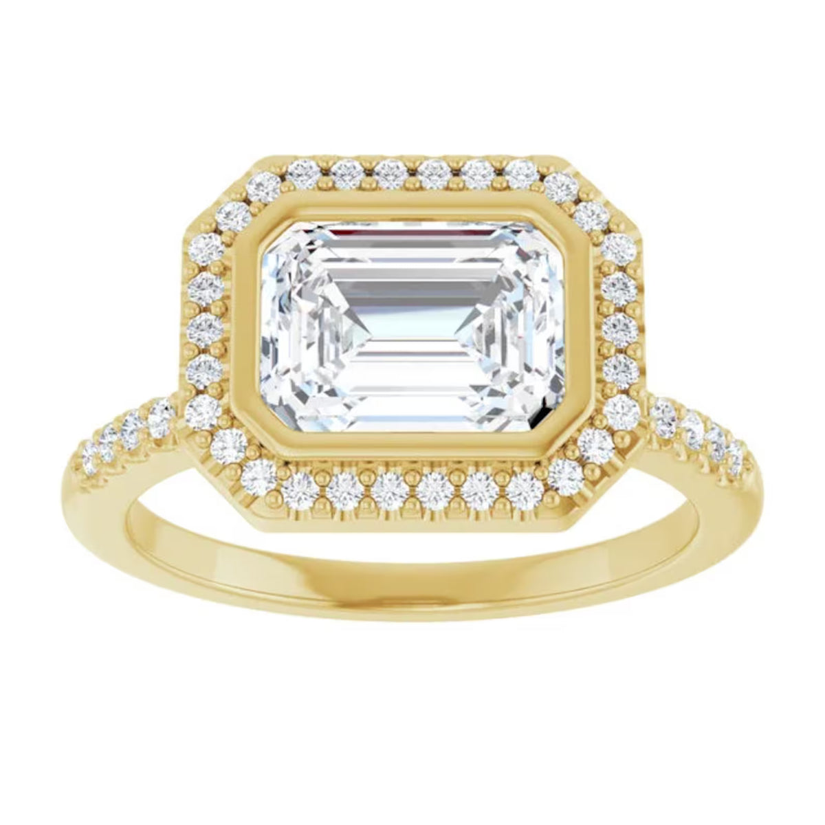 Direct top view of a 3 CT East-West horizontally set emerald cut lab diamond with an octagonal pave halo in yellow gold.