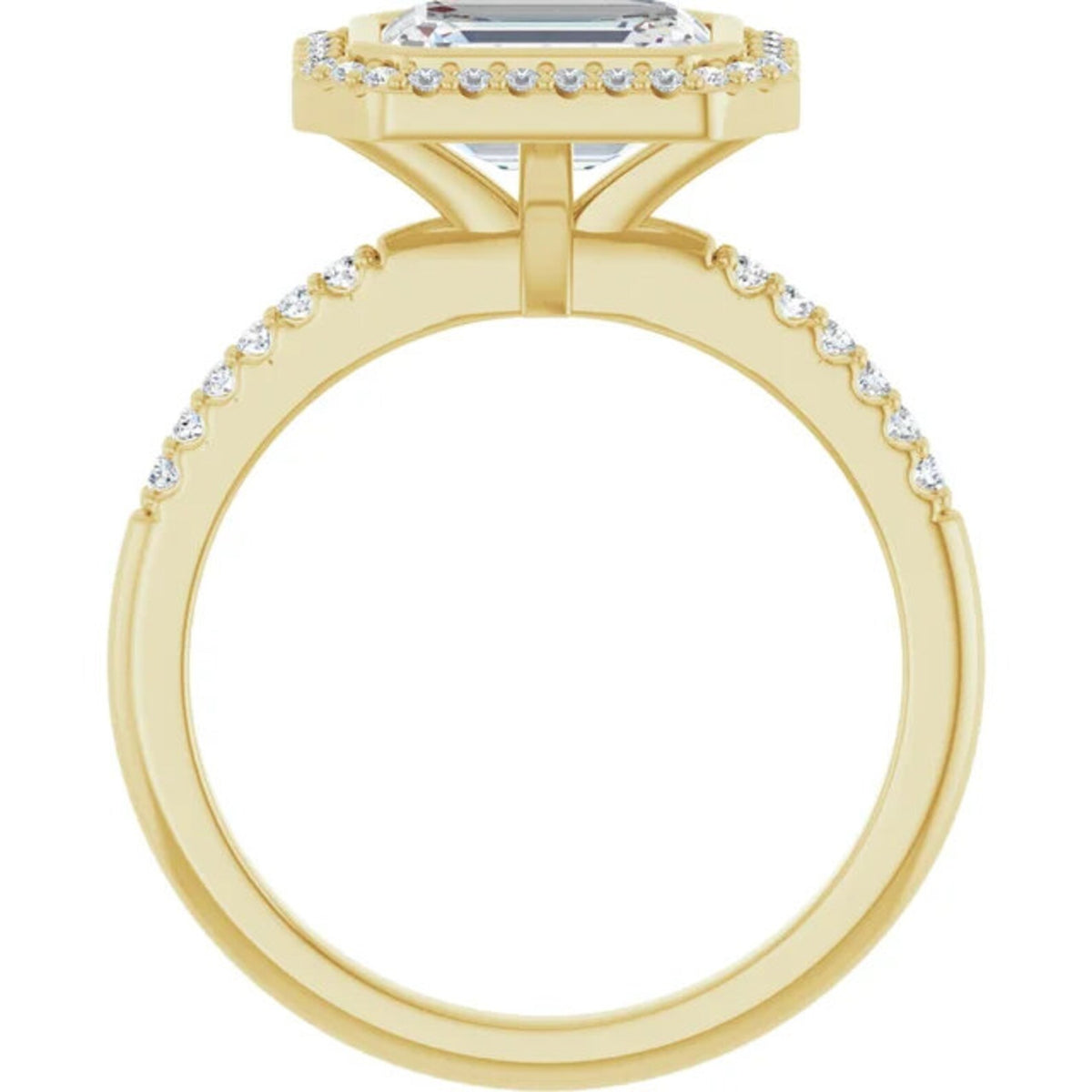 Direct side profile view showing the elevated setting and cathedral bridge of a 3 CT East-West emerald cut ring in yellow gold.