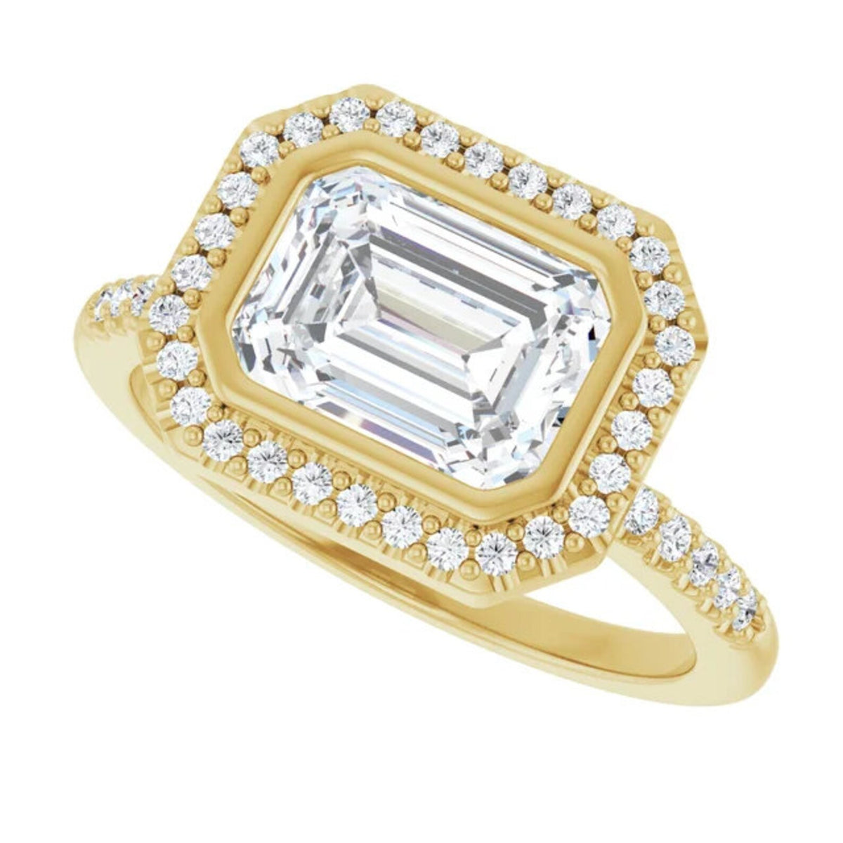 Angled front view of a 3 CT East-West emerald cut lab-grown diamond ring featuring a bezel halo and pave accent band.