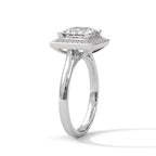 Angled side view of a 3 CT princess cut lab-grown diamond engagement ring with a micro-pave frame halo in 14K white gold.