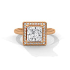 Top-down view of a 3 CT princess cut lab-grown diamond engagement ring with square pave frame halo in 14K rose gold.