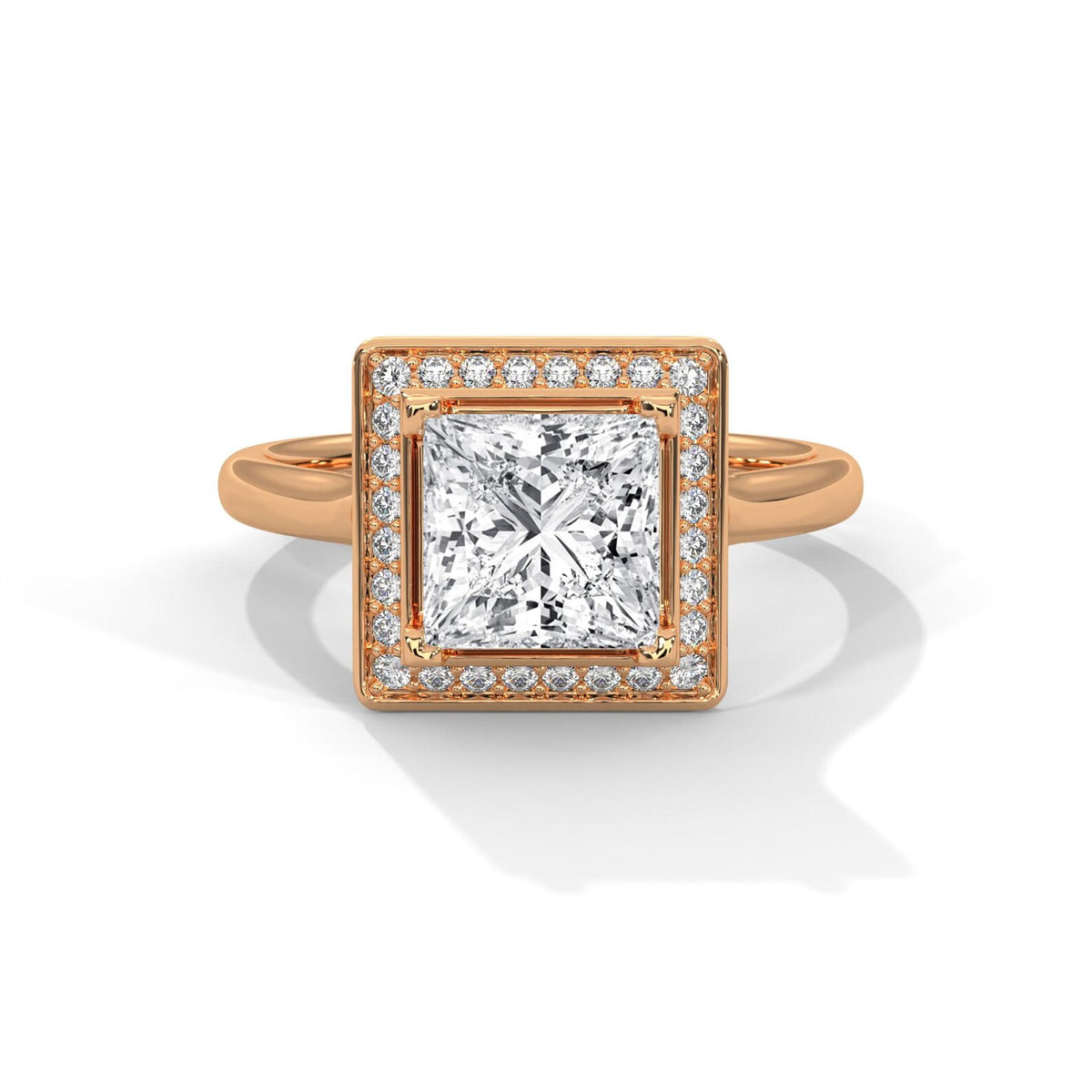 Top-down view of a 3 CT princess cut lab-grown diamond engagement ring with square pave frame halo in 14K rose gold.