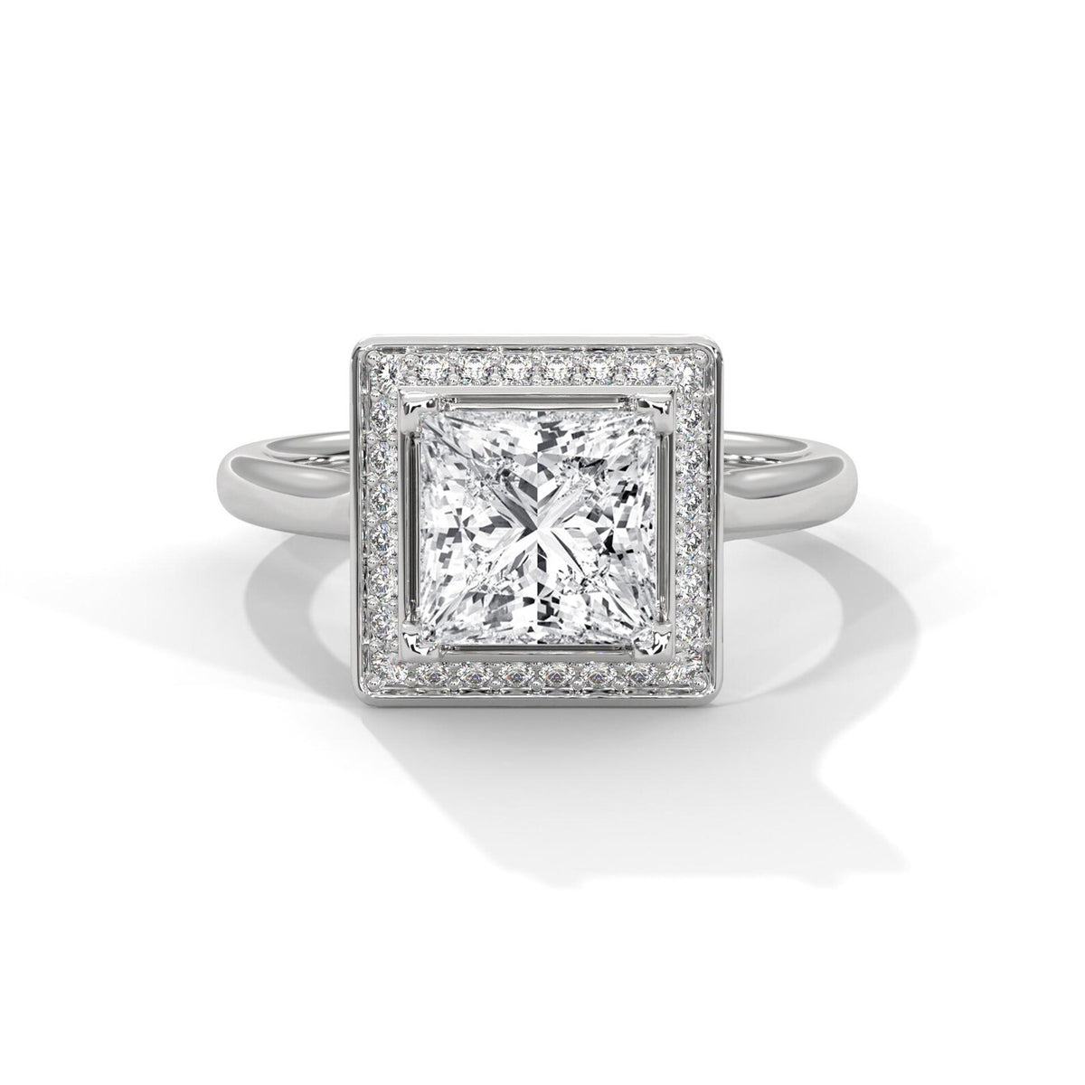 Top-down view of a 3 CT princess cut lab-grown diamond engagement ring with micro-pave halo on a plain white gold band.