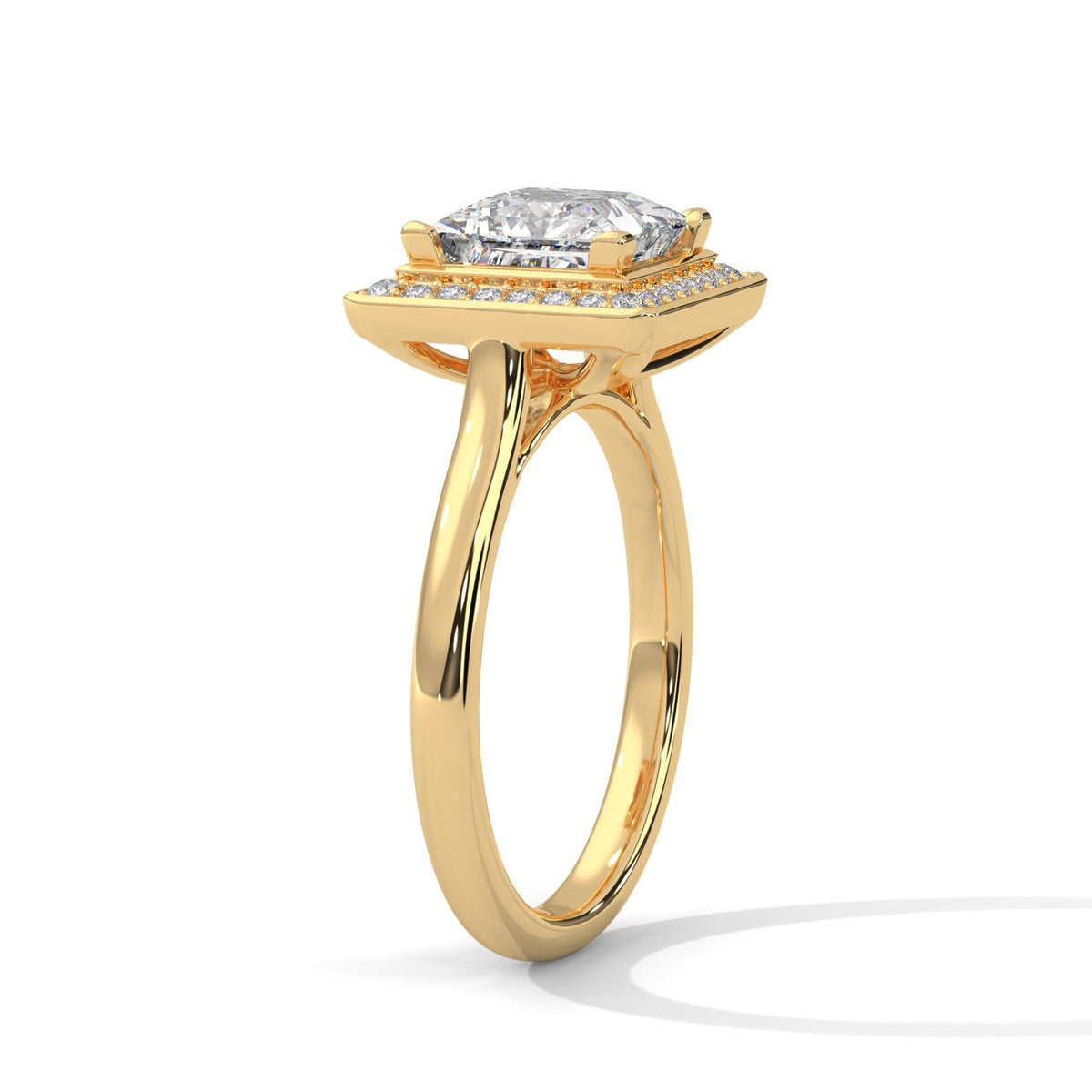 Angled perspective view of a 3 CT princess cut lab-grown diamond engagement ring in 14K yellow gold.
