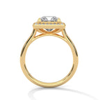 Direct side profile view showing cathedral bridge and elevated basket setting of a 3 CT princess cut ring in yellow gold.
