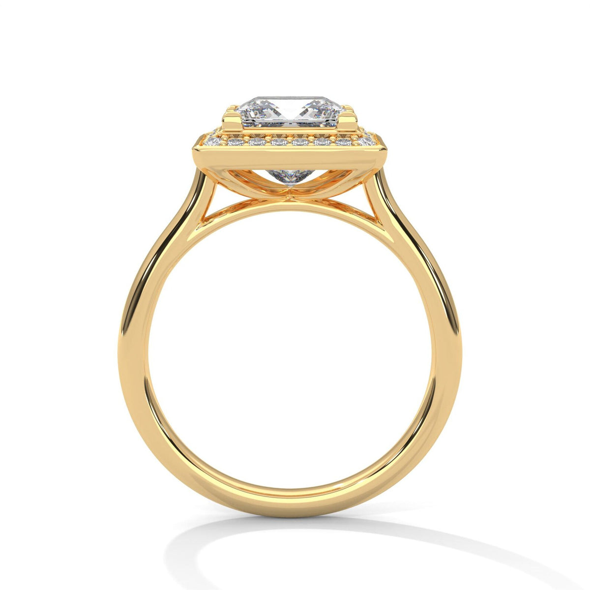 Direct side profile view showing cathedral bridge and elevated basket setting of a 3 CT princess cut ring in yellow gold.