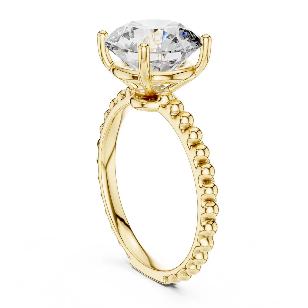Gold ring with a large round cut diamond on a white background