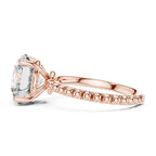 Side profile view of a 3 CT round lab diamond engagement ring with a bubble beaded band in 14K rose gold.