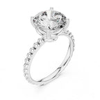 Three-quarter perspective view of a 3 CT round lab diamond ring with a textured beaded band in white gold.
