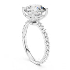 Vertical side perspective of a 3 CT round lab diamond engagement ring with a beaded band in white gold.