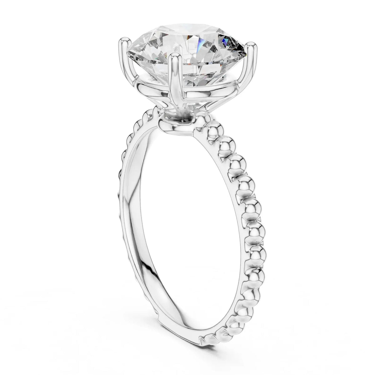 Vertical side perspective of a 3 CT round lab diamond engagement ring with a beaded band in white gold.