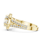 Side view profile of a 3 CT round lab diamond split shank halo engagement ring in 14K yellow gold.