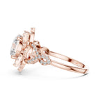 Side profile view of a 3 CT round lab diamond engagement ring showing twisted band details in 14K rose gold.