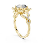 Low angle side profile view of a 3 CT round lab-grown diamond ring showing the twisted pavé shank in yellow gold.