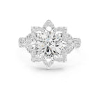Direct top view of a 3 CT round brilliant lab-grown diamond ring with an intricate petal halo setting in white gold.