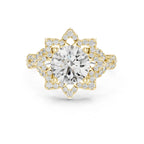 Direct top view of a 3 CT round lab diamond engagement ring with a star halo frame in 14K yellow gold.
