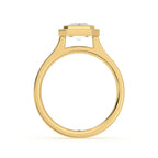 Side elevation profile view of a yellow gold 3 CT radiant lab diamond bezel ring showing the open gallery architecture.