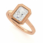 Angled view of a 3 CT radiant cut lab diamond bezel solitaire engagement ring in 14K rose gold.