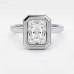 Direct front view of a 3 CT radiant cut lab diamond solitaire ring set in a white gold milgrain bezel frame.