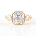 Top-down view of a full bezel 3 CT Asscher cut lab grown diamond ring flanked by two bezel pear side stones.